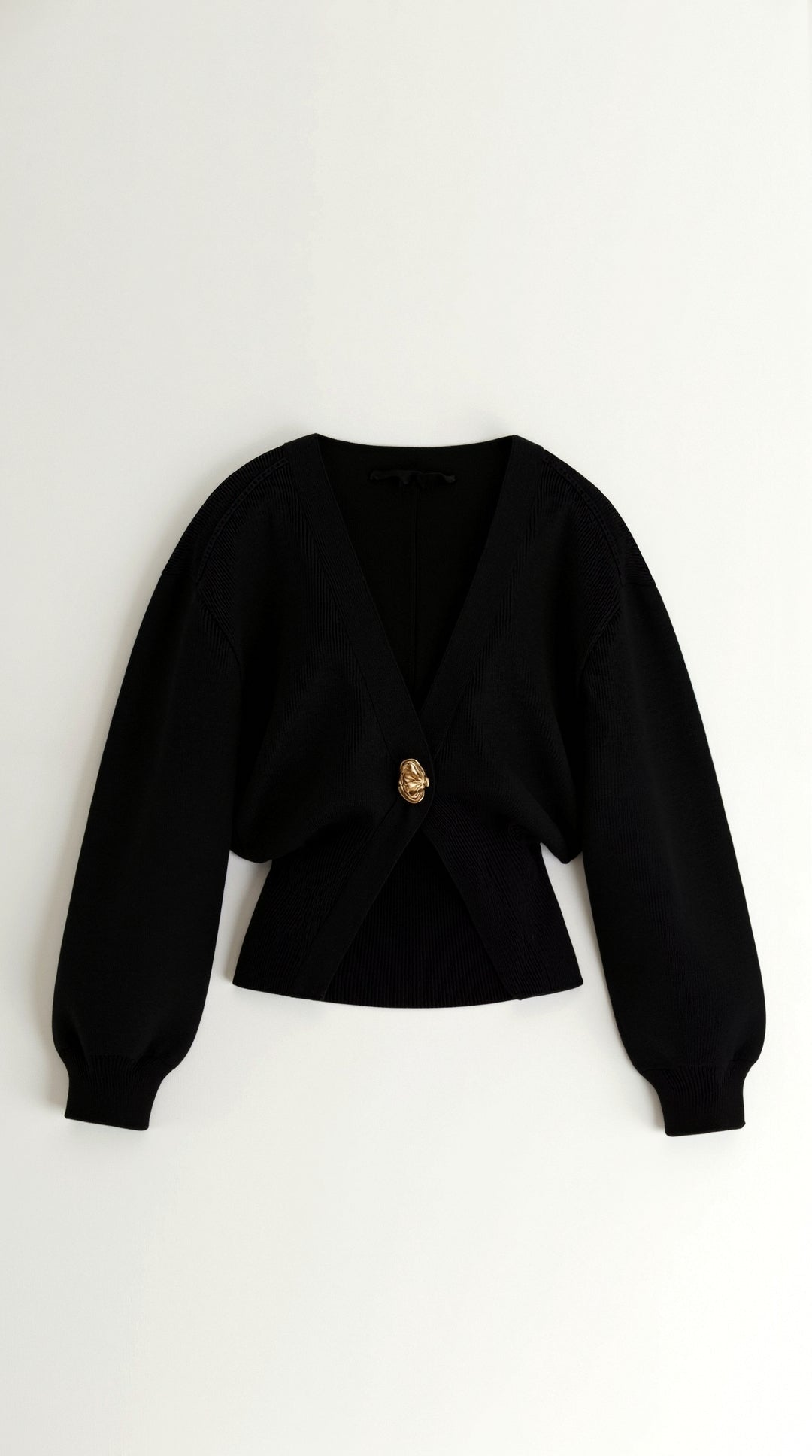 ARABELLA | JERSEY DE PUNTO CON ESCOTE EN V